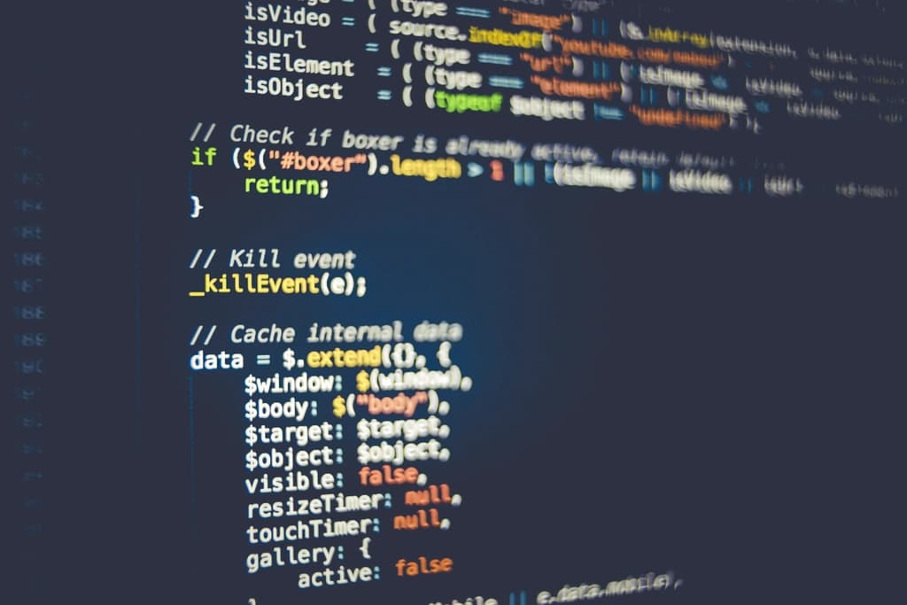 Close-up of code on a dark screen